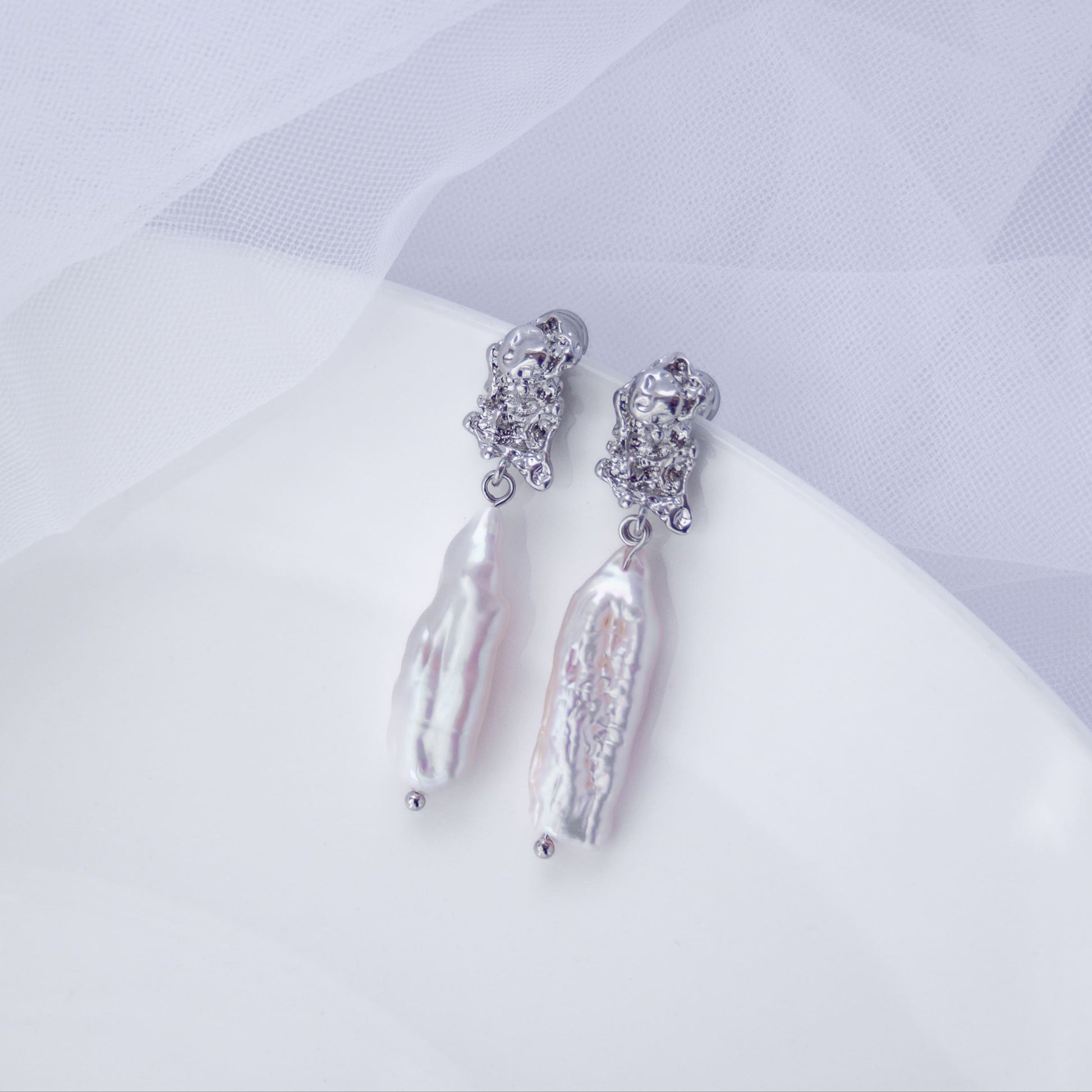 Chunky baroque pearl earrings with silver-tone textured metal top – large drop pearl earrings for weddings or special occasions
