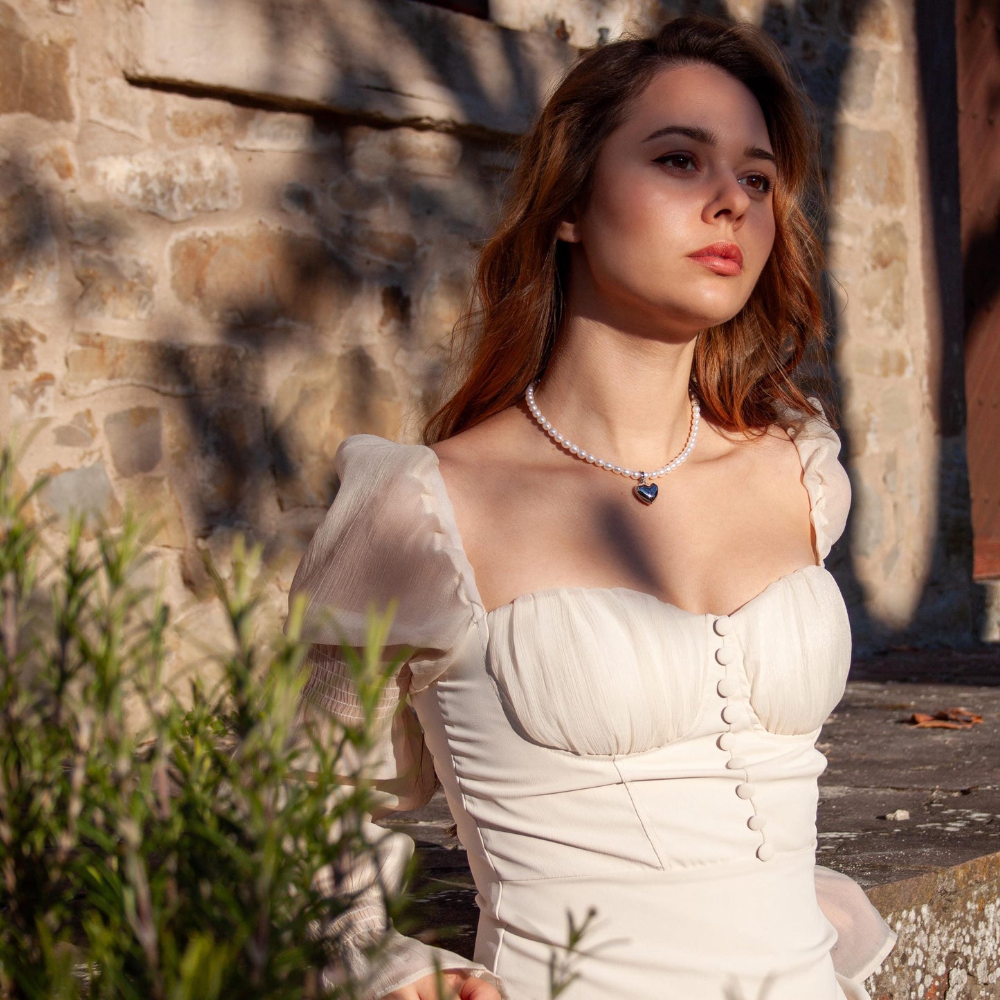 Freshwater pearl choker with silver heart pendant